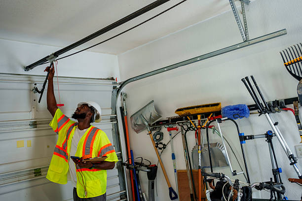 Professional Garage Door Panel Replacement technician working in Logan County County, IL